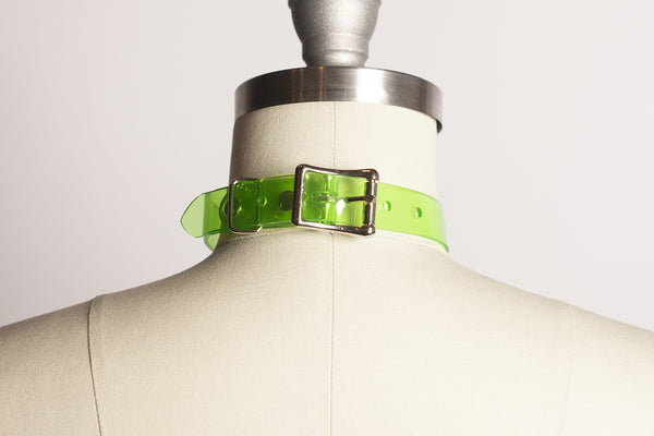 Apatico and Anhedonie choker collar necklace in neon uv green with acrylic citrus center.