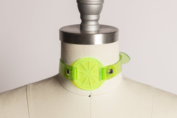Apatico and Anhedonie choker collar necklace in neon uv green with acrylic citrus center.