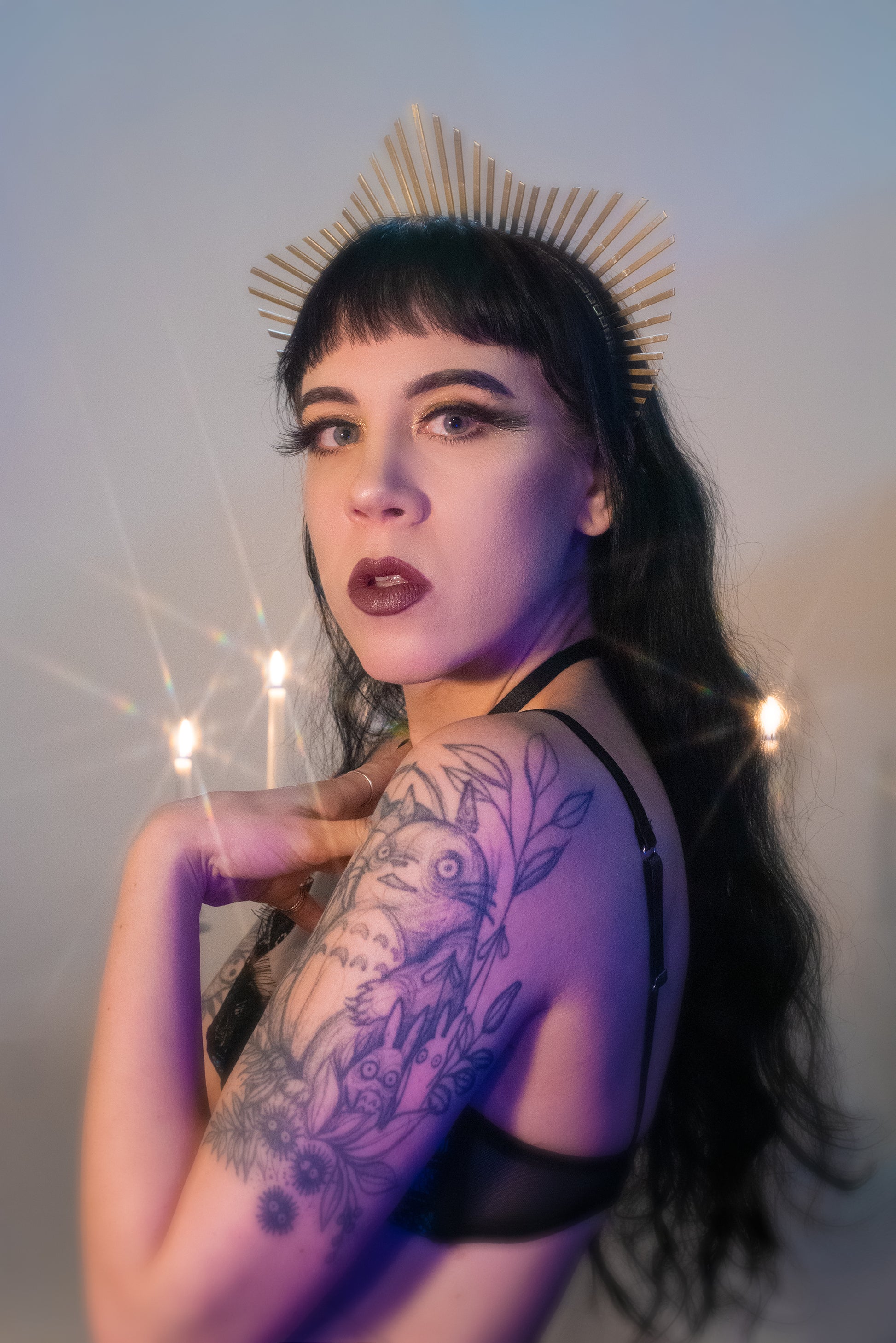 Diamond shaped halo crown headpiece made out of gold zip ties by Apatico.