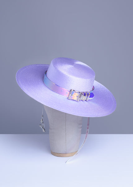 Apatico wide brim harness hat in pastel lavender with an iridescent, holographic pvc buckle band and harness straps.