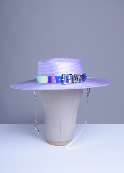 Apatico wide brim harness hat in pastel lavender with an iridescent, holographic pvc buckle band and harness straps.