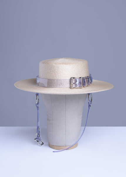 apatico harness hat beight light tan clear pvc buckle band and chin straps, minimal neutral editorial goth style