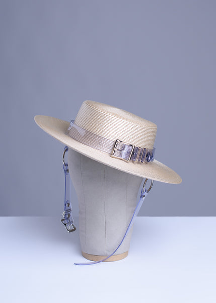 apatico harness hat beight light tan clear pvc buckle band and chin straps, minimal neutral editorial goth style