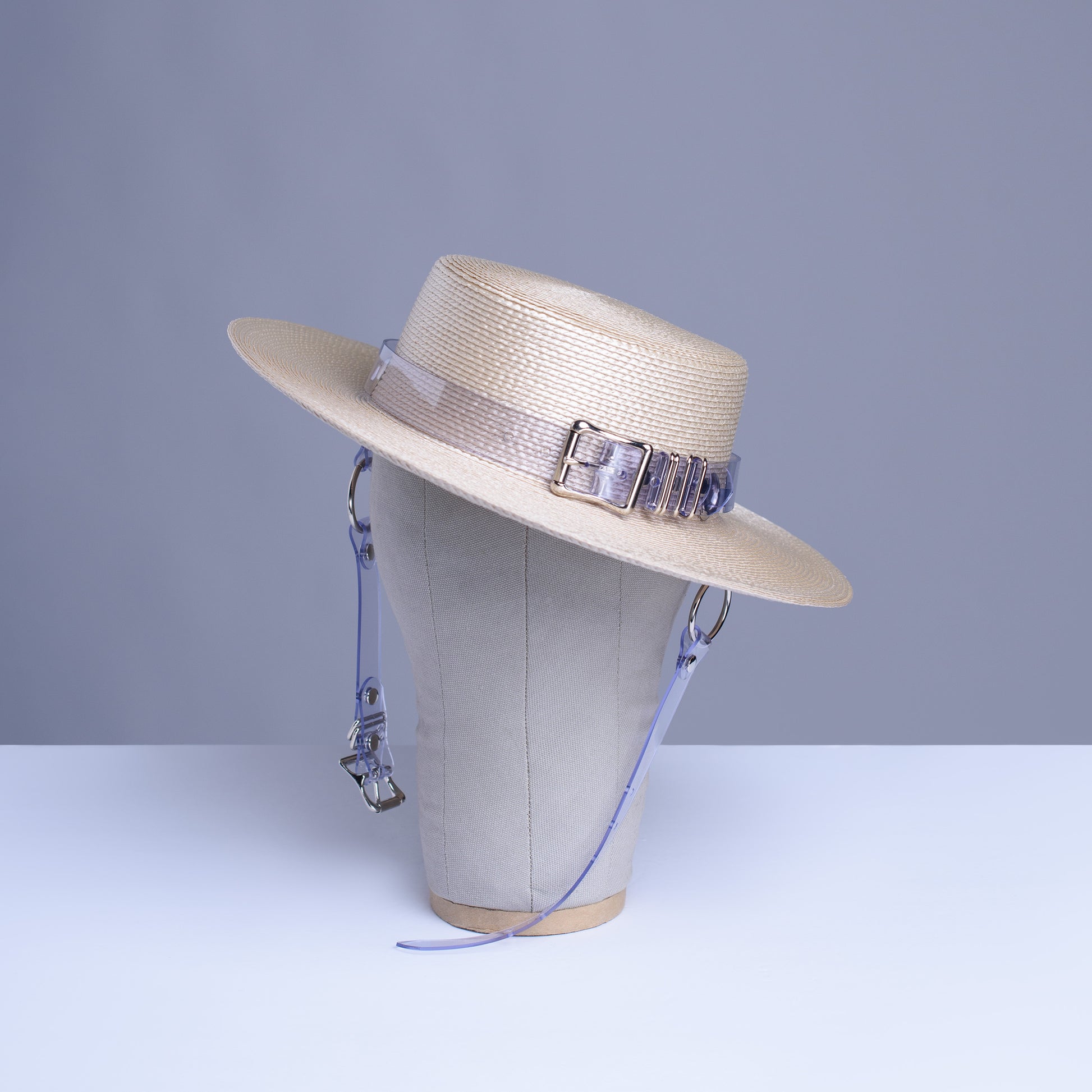apatico harness hat beight light tan clear pvc buckle band and chin straps, minimal neutral goth style