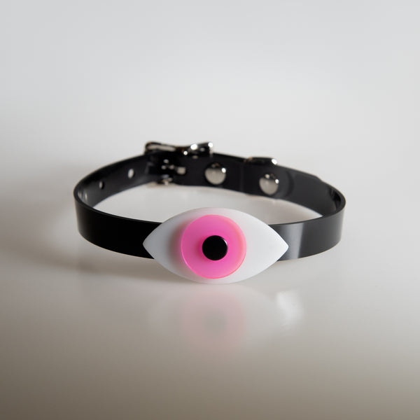 Apatico eyeball choker collar in uv neon pink for Pride.