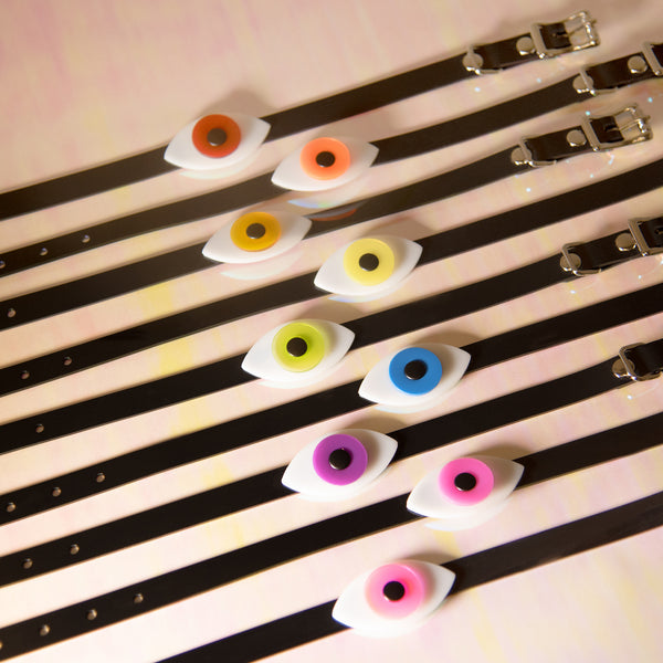 Apatico eyeball choker collars in a rainbow of colors for Pride.