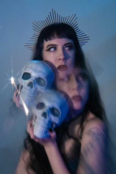 Star shaped halo crown headpiece made out of gold zip ties by Apatico.