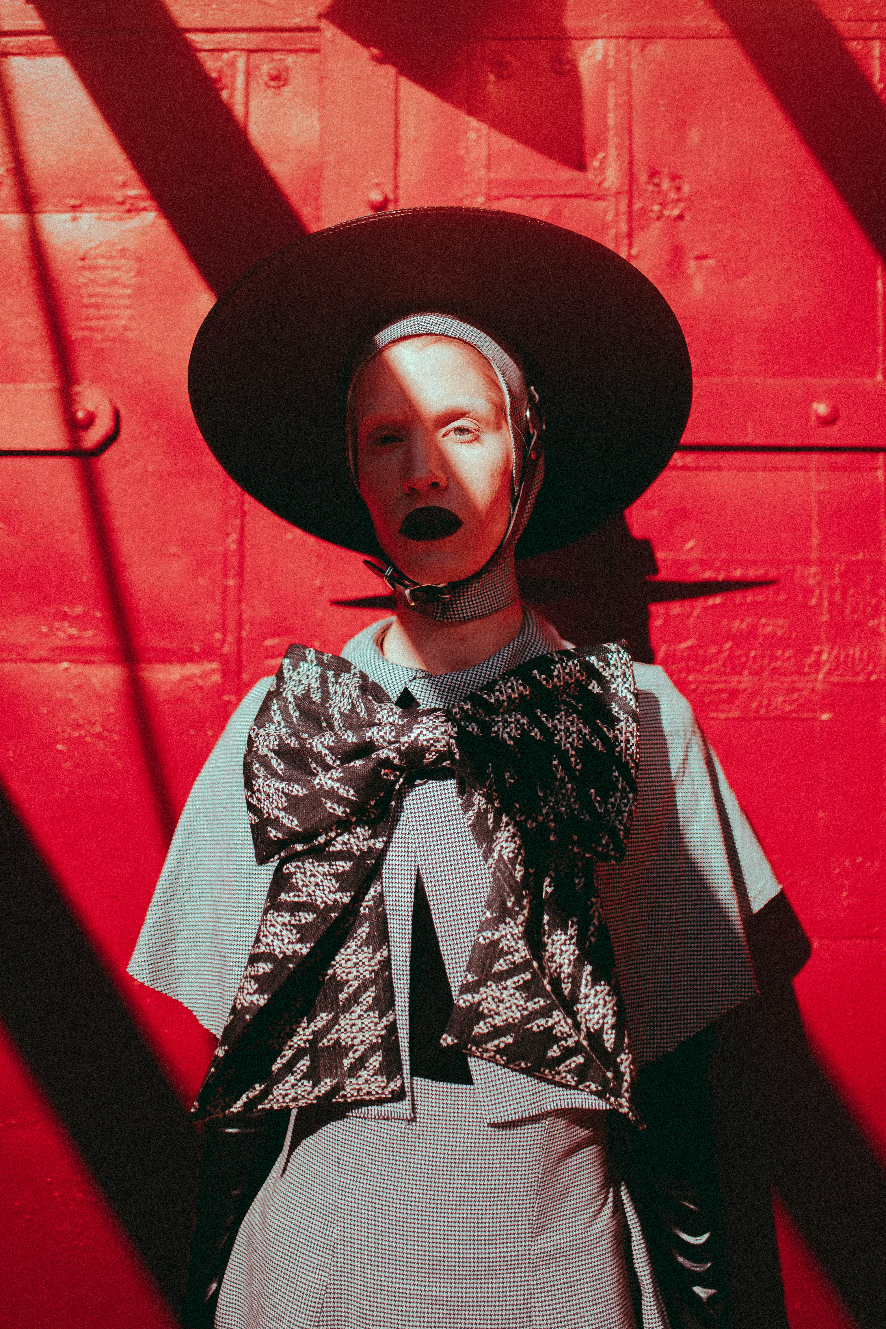 Black straw harness hat with buckle details - photography by Emma Wondra - Clothing by Samantha Rei.